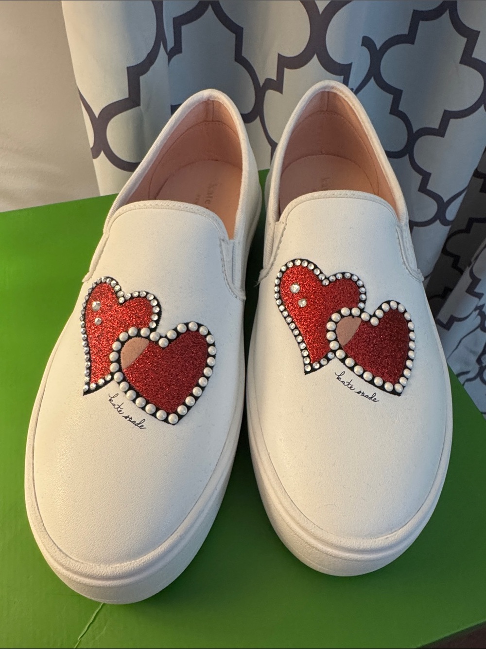 kate spade White Slip-On Sneakers with Red Glitter Heart Appliqués